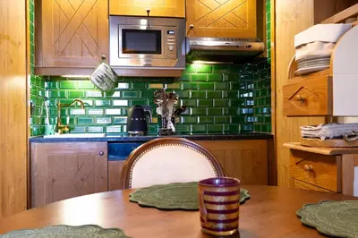 Cuisine ou kitchenette dans l'établissement ARC 1950 Ovis D'Or, view Mont Blanc