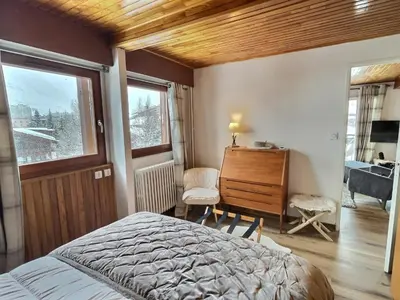 Un ou plusieurs lits dans un hébergement de l'établissement Charmant 2 pièces rénové avec Wifi à Val d'Isère pour 4 personnes - FR-1-411-939