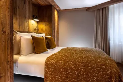 Un ou plusieurs lits dans un hébergement de l'établissement Chalet privé de Luxe IGLOO avec Piscine Sauna et Cheminée, 4 chambres, 220m2 by HOTEL MONTBLANC