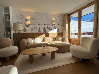 Coin salon dans l'établissement Appartement neuf et cosy les Tommeuses vue splendide, sur piste, Tignes Val Claret