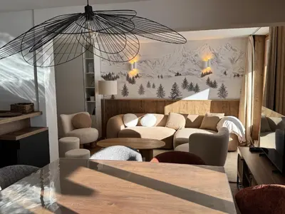 Coin salon dans l'établissement Appartement neuf et cosy les Tommeuses vue splendide, sur piste, Tignes Val Claret