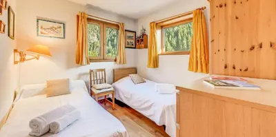 Un ou plusieurs lits dans un hébergement de l'établissement Chalet Le Prairial - Chalets pour 8 Personnes MAE-0071