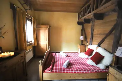 Un ou plusieurs lits dans un hébergement de l'établissement Chalet Alpina résidence Val Claret