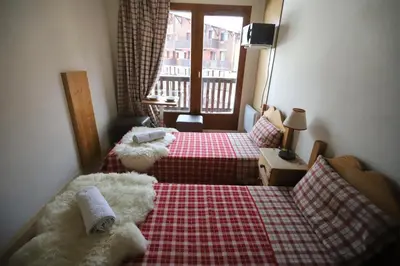 Un ou plusieurs lits dans un hébergement de l'établissement Chalet Alpina résidence Val Claret