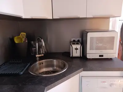 Cuisine ou kitchenette dans l'établissement MyHome - Génépis 33 - 4 pax skis aux pieds - Val Claret
