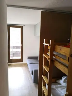 Un ou plusieurs lits dans un hébergement de l'établissement MyHome - Plein Soleil 31 - Charmant studio 4 personnes au pied des pistes - Val Claret