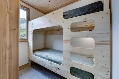 Un ou plusieurs lits dans un hébergement de l'établissement Appartement Ski aux Pieds 2100m - Le Nid Tignes Val Claret