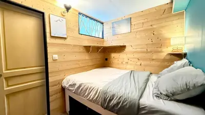 Un ou plusieurs lits dans un hébergement de l'établissement La Perdrix Blanche Appartement moderne Ski aux pieds - Vue panoramique et chambre séparée - 4 pers - Arcs 2000