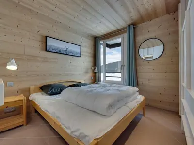 Un ou plusieurs lits dans un hébergement de l'établissement Appartement lumineux à Tignes, ski aux pieds, WIFI, 4 pers. - FR-1-502-589
