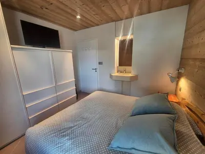 Un ou plusieurs lits dans un hébergement de l'établissement Appartement lumineux à Tignes, ski aux pieds, WIFI, 4 pers. - FR-1-502-589