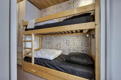 Un ou plusieurs lits dans un hébergement de l'établissement Résidence Hauts Du Val Claret B2 - Appartement renové·Pied des pistes·Balcon MAE-9001