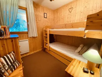 Un ou plusieurs lits dans un hébergement de l'établissement Confortable appartement 6 pers, prox pistes, parking inclus - FR-1-757-131