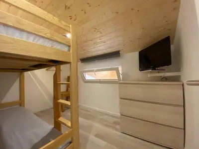 Un ou plusieurs lits dans un hébergement de l'établissement belleplagne