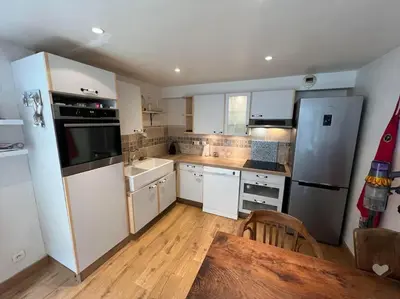 Cuisine ou kitchenette dans l'établissement Appartement cosy - 3 personnes