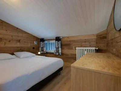 Un ou plusieurs lits dans un hébergement de l'établissement Appartement rénové 3 pièces à Tignes, balcon, proche pistes, WIFI - FR-1-502-591