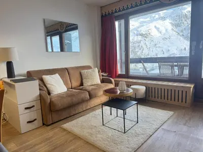 Coin salon dans l'établissement BEC452- Superbe 2 pièces, vue Lac - Tignes