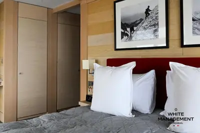 Un ou plusieurs lits dans un hébergement de l'établissement Chalet Licorne - Chalet de prestige au Belvédère MAE-3924