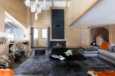 Coin salon dans l'établissement Chalet Licorne - Chalet de prestige au Belvédère MAE-3924