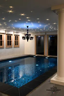 Piscine de l'établissement Chalet Licorne Des Neiges - Somptueux chalet sur les hauteurs du Belvédère MAE-3934 ou située à proximité