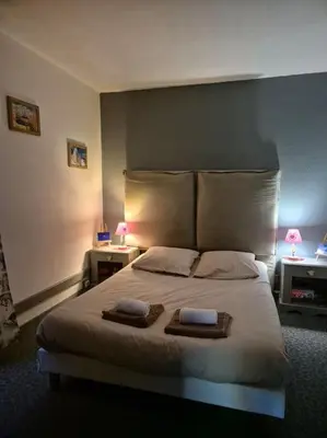 Un ou plusieurs lits dans un hébergement de l'établissement BOR52 - BEAU T2 Rénové - pied des pistes- VAL CLARET