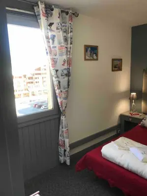 Un ou plusieurs lits dans un hébergement de l'établissement BOR52 - BEAU T2 Rénové - pied des pistes- VAL CLARET
