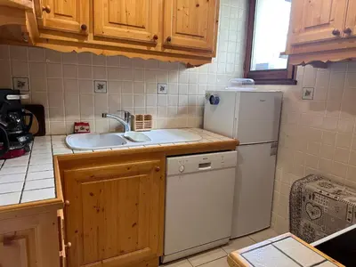 Cuisine ou kitchenette dans l'établissement Spacieux appartement 6 pers, proche centre, animaux admis - FR-1-464-241
