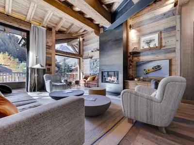 Coin salon dans l'établissement Chalet 12 pers, Piscine, Hammam, Proche pistes, Val d'Isère - FR-1-567-129
