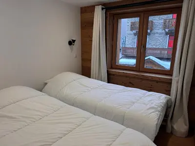 Un ou plusieurs lits dans un hébergement de l'établissement Appartement rénové, parking privé, 6 personnes, Pralognan-la-Vanoise - FR-1-464-236