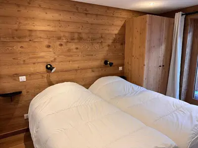Un ou plusieurs lits dans un hébergement de l'établissement Appartement neuf avec terrasse sud, parking privatif, 3 pièces, 6 pers - FR-1-464-235