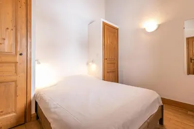 Un ou plusieurs lits dans un hébergement de l'établissement Résidence Le Clos Vanoise - 3 pièces mezzanine spacieux et confortable. MAE-4311