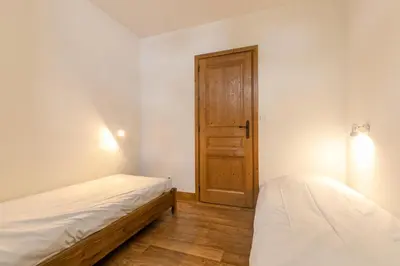 Un ou plusieurs lits dans un hébergement de l'établissement Résidence Le Clos Vanoise - 3 pièces mezzanine spacieux et confortable. MAE-4311