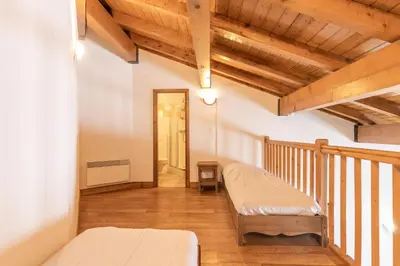 Un ou plusieurs lits dans un hébergement de l'établissement Résidence Le Clos Vanoise - 3 pièces mezzanine spacieux et confortable. MAE-4311
