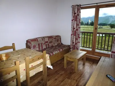 Coin salon dans l'établissement Résidence Le Clos Vanoise - 3 Pièces pour 7 Personnes MAE-4351