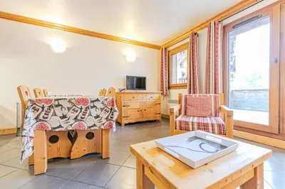 Télévision ou salle de divertissement dans l'établissement Résidence Le Criterium - Résidence Le Critérium 3 Chalet B Appartement 1 MAE-4381