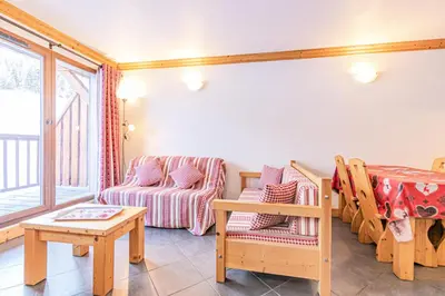 Coin salon dans l'établissement Résidence Le Criterium - Résidence Le Critérium 3 Chalet D Appartement 7 MAE-4391