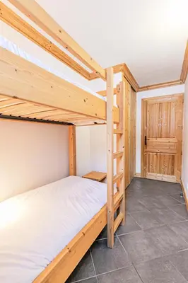 Un ou plusieurs lits dans un hébergement de l'établissement Résidence Le Criterium - Résidence Le Critérium 3 Chalet D Appartement 7 MAE-4391