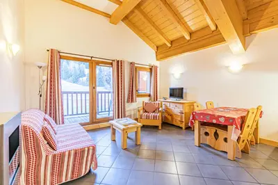 Télévision ou salle de divertissement dans l'établissement Résidence Le Criterium - Résidence Le Critérium 3 Chalet A Appartement 7 MAE-4401