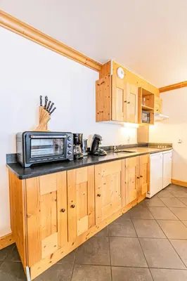 Cuisine ou kitchenette dans l'établissement Résidence Le Criterium - Résidence Le Critérium 3 Chalet D Appartement 1 MAE-4451