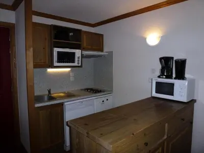 Cuisine ou kitchenette dans l'établissement Résidence Le Clos Vanoise - 2 Pièces pour 6 Personnes MAE-4541