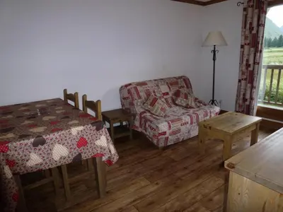 Coin salon dans l'établissement Résidence Le Clos Vanoise - 2 Pièces pour 6 Personnes MAE-4541