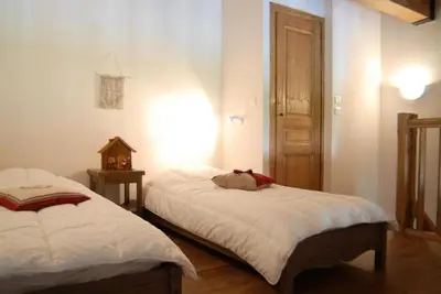 Un ou plusieurs lits dans un hébergement de l'établissement Résidence Le Clos Vanoise - Studi mezzanine chaleureux MAE-4561