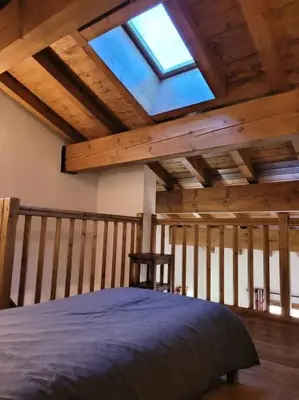 Un ou plusieurs lits dans un hébergement de l'établissement Résidence Le Clos Vanoise - Studi mezzanine chaleureux MAE-4561