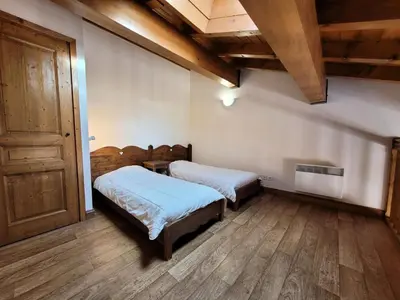 Un ou plusieurs lits dans un hébergement de l'établissement Résidence Le Clos Vanoise - Studio mezzanine chalereux MAE-4571