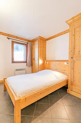 Un ou plusieurs lits dans un hébergement de l'établissement Résidence Le Criterium - Résidence Le Critérium 3 Chalet D Appartement 3 MAE-4581
