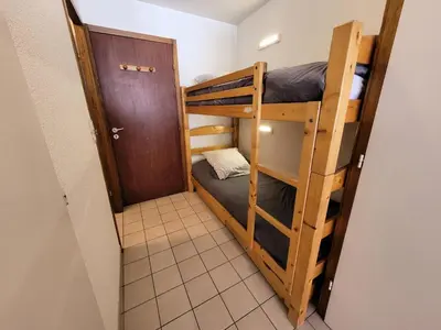 Un ou plusieurs lits dans un hébergement de l'établissement Résidence Le Soliet 2 - Studio pour 4 Personnes MAE-4671
