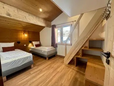 Un ou plusieurs lits dans un hébergement de l'établissement CHALET - DUPLEX neuf 8 pax - pied des pistes - parking privé - cheminée - Skiroom - 3 rooms & mezzanine