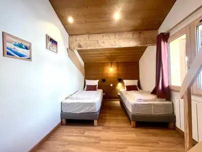 Un ou plusieurs lits dans un hébergement de l'établissement CHALET - DUPLEX neuf 8 pax - pied des pistes - parking privé - cheminée - Skiroom - 3 rooms & mezzanine