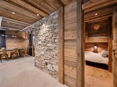 Un ou plusieurs lits dans un hébergement de l'établissement Alpina Lodge - appartement Premium avec Sauna à Val Cenis