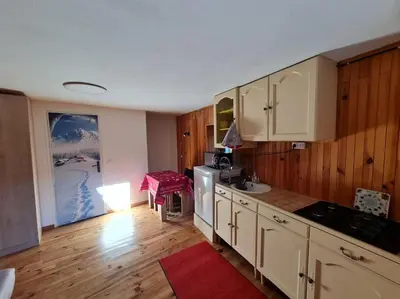 Cuisine ou kitchenette dans l'établissement Le coquelicot -Draps inclus