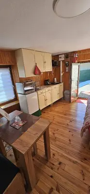 Cuisine ou kitchenette dans l'établissement Le coquelicot -Draps inclus